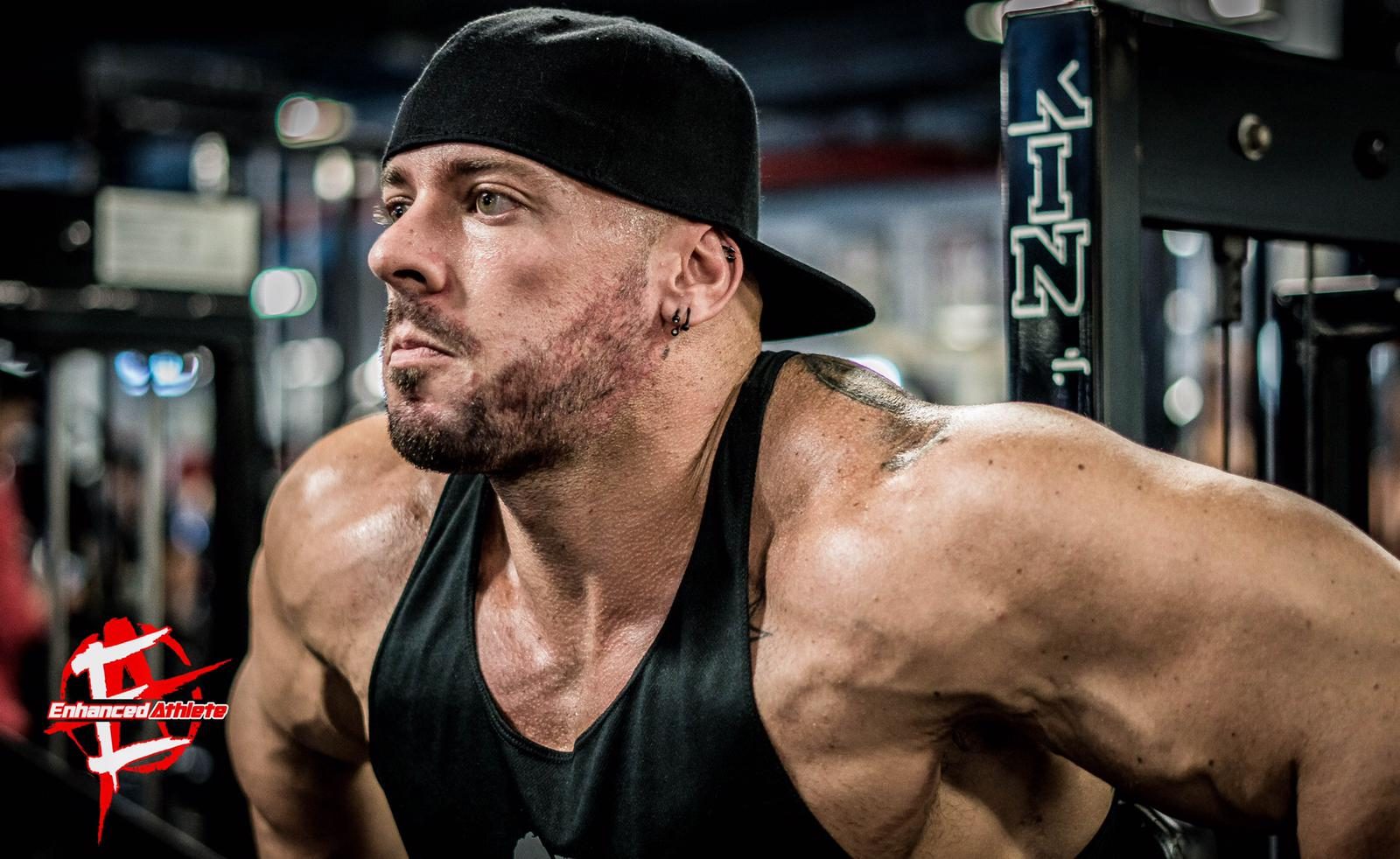 Coach Trevor, backwards cap, between sets